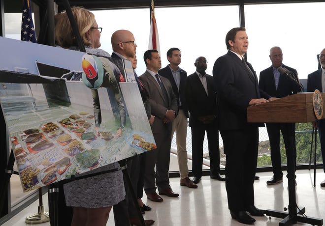 Florida Gov. Ron DeSantis speaks about his plan to protect the environment during an event at the University of Miami Rosensteil School of Marine and Atmospheric Science on May 7 in Miami. [AP Photo/Lynne Sladky]