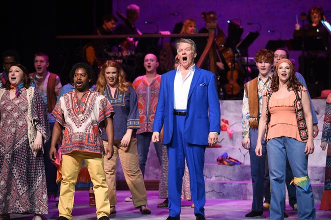 Michael Lackey leads the cast of “The Music of Andrew Lloyd Webber” in a song from “Joseph and the Amazing Technicolor Dreamcoat.”