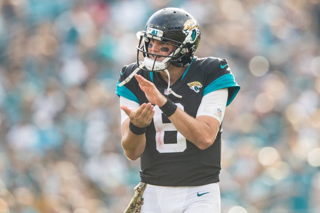 Jacksonville Jaguars quarterback Cody Kessler (6) hypes up his team in the fourth quarter. The final score was 6-0 Jaguars. The Jacksonville Jaguars hosted the Indianapolis Colts at TIAA Bank Field In Jacksonville, Florida Sunday, December 2, 2018. [James Gilbert/For the Times-Union]