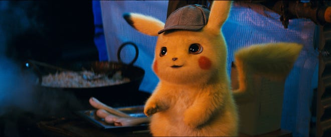 Detective Pikachu (voiced by Ryan Reynolds) is on a case in Ryme City where human and Pokemon are supposed to live in harmony in "Pokémon Detective Pikachu." [Warner Bros. Pictures]