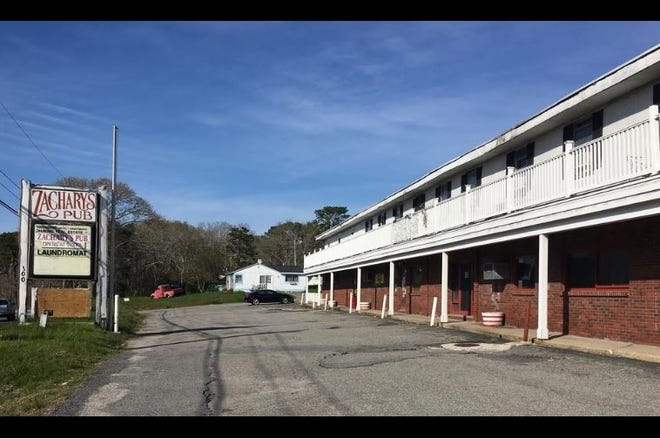 The parking lot at Zachary's Pub was almost empty Wednesday. [Cape Cod Times photo/ Beth Treffeisen]