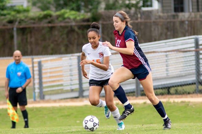 Kate Perko (22) scored the game-winning goal with two seconds left in Terry Sanford's 1-0 victory over Southeast Guilford on Thursday. [Raul F. Rubiera/The Fayetteville Observer]