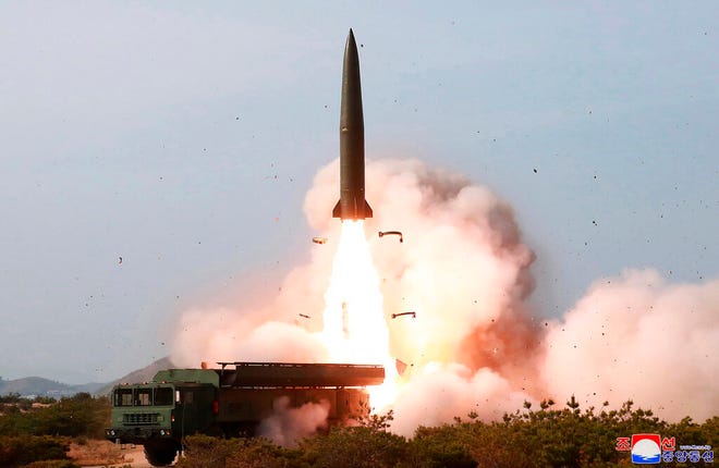 FILE - This May 4, 2019, file photo provided by the North Korean government shows a launch of a missile in the east coast of North Korea. Experts say North Koreaâ€™s latest launches suggest it may have acquired or cloned a short-range missile the Russian military has long earmarked for export. Itâ€™s still unclear if the North bought them or built them itself, but experts say the missiles it launched over the past week look just like a nuclear-capable ballistic missile that has long been a source of tension in Europe. Korean language watermark on image as provided by source reads: "KCNA" which is the abbreviation for Korean Central News Agency. (Korean Central News Agency/Korea News Service via AP, File)