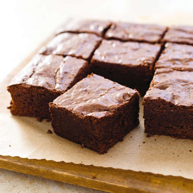 This Fudgy Brownies recipe appears in the cookbook "The Perfect Cookie." (Carl Tremblay/America's Test Kitchen via AP)