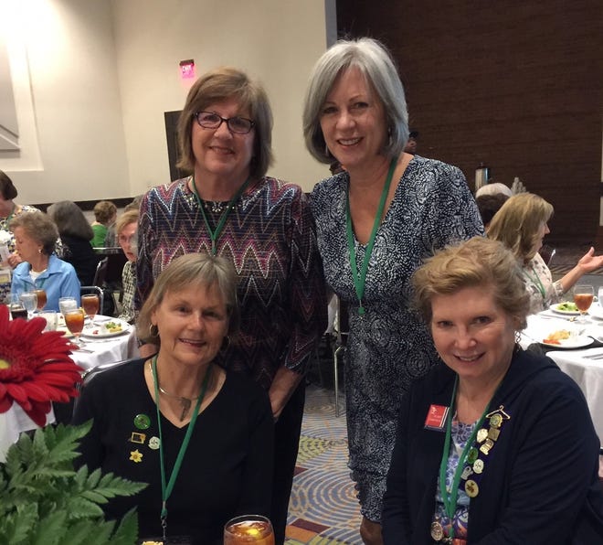 Representing the Garden Club Council of Athens at the Garden Club of Georgia Inc. 91st Annual Convention in Columbus in April were, sitting from left, Monika Kapousous, and Janie Seglund; and standing, from left, Carol Reap and Ina Hopkins. [Contributed]