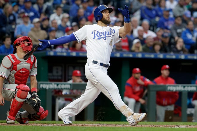 The Royals' Alex Gordon watches the first of his two home runs during the first inning Friday against the Phillies in Kansas City, Mo. [AP Photo/Charlie Riedel]