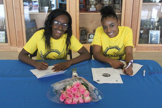 South Lenoir seniors Toni Foster (left) and D'Angel Williams (right) will team up and run at NC Wesleyan starting this fall. [Laieke Abebe/Kinston Free Press]