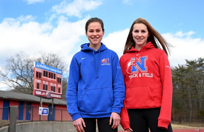 Natick senior Grace Connolly (right) poses for a picture with her sophomore sister Kate. Grace Connolly broke former Marblehead High grad and Olympian runner Shalane Flanagan's course record for the 2 mile at the Coaches Invtational at Sharon High on Saturday. It was a 19-year course record. [Daily News and Wicked Local File Photo/Ken McGagh]