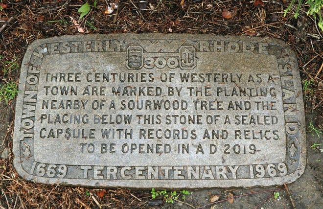 A plaque at Wilcox Park marks where a time capsule was buried in 1969. It will be opened in June during the 350th-anniversary celebrations. [The Providence Journal / Bob Breidenbach]