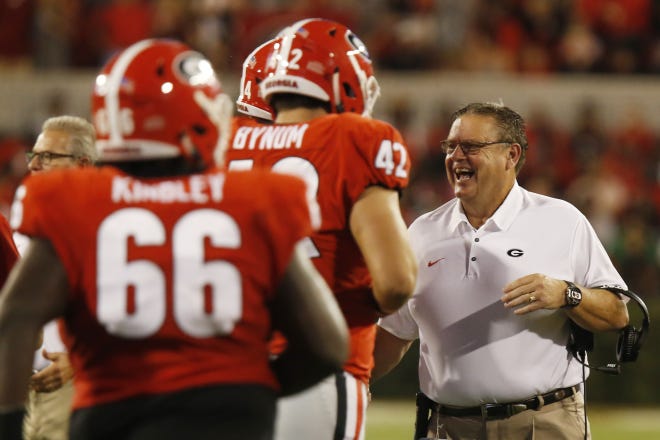 Georgia offensive line coach Sam Pittman and the Bulldogs landed four-star offensive lineman Tate Ratledge on Monday. [JOSHUA L. JONES/ATHENS BANNER-HERALD FILE PHOTO]
