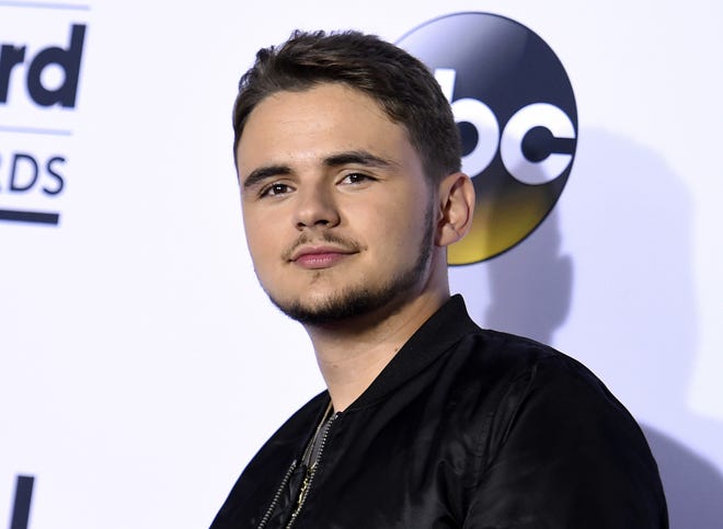 FILE - In this May 21, 2017 file photo, Prince Jackson poses in the press room at the Billboard Music Awards in Las Vegas. Michael JacksonþÄôs eldest child Prince is a college graduate. Twenty-two-year-old Prince Jackson, whose real name is Michael Joseph Jackson Jr. went through commencement ceremonies Saturday, May 11, 2019 at Loyola Marymount University in Los Angeles. (Photo by Richard Shotwell/Invision/AP, File)