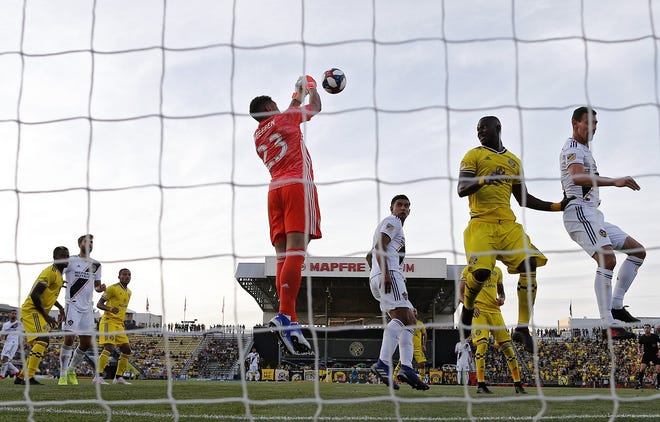 Crew SC goalkeeper Zack Steffen knocks the ball away on a corner kick against the Los Angeles Galaxy during a game May 8 in Mapfre Stadium. [Kyle Robertson]