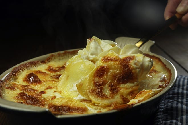 The ingredients for pommes dauphinoise come together. (Terrence Antonio James/Chicago Tribune/TNS)