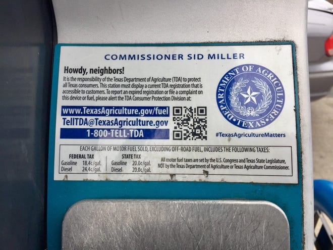 Texas Agriculture Commissioner Sid Miller's "Howdy, neighbors!" sticker is affixed to every fuel pump in the state. Miller's agency regulates the pumps. A Texas House bill seeks to move that regulation to the Texas Department of Licensing and Regulation. [KEN HERMAN / AMERICAN-STATESMAN]