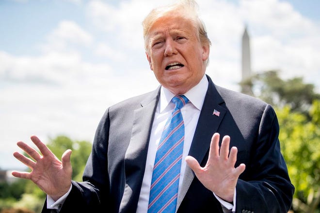 President Donald Trump speaks to members of the media on the South Lawn of the White House in Washington, Tuesday, May 14, 2019, before boarding Marine One for a short trip to Andrews Air Force Base, Md., to travel to Louisiana.