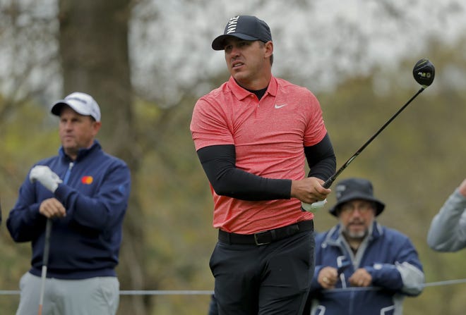 Brooks Koepka watches his shot off the second tee during a practice round at the PGA Championship on Tuesday in Farmingdale, N.Y. [AP Photo/Julie Jacobson]