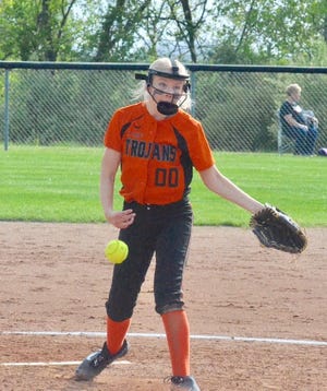 Newcomerstown High's Karley Ingle delivers a pitch during Wednesday's Division III district semifinal game against Martins Ferry at the Harrison Central ballfield in Cadiz. The Lady Trojans dropped a tough 3-2 decision to the Lady Purple Riders.