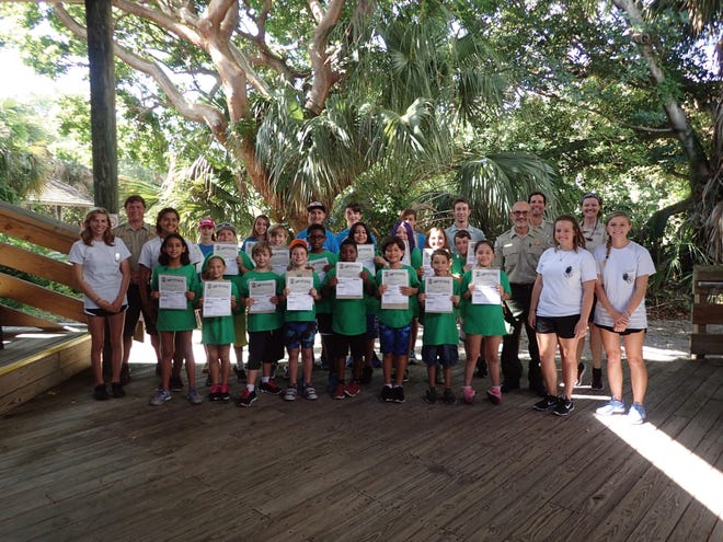 Kids are shown taking the Jr. Ranger Pledge. On Saturday, Topsail Hill Preserve State Park will host a Junior Ranger Jamboree. [FLORIDA STATE PARKS/CONTRIBUTED PHOTO]