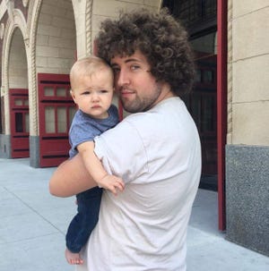 Ely Hydes with his son, Cy.