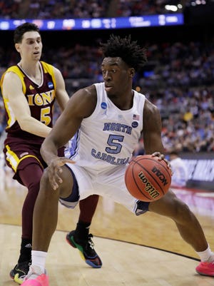 North Carolina's Nassir Little, right, has a 7-foot-1 wingspan, but his 3-point shooting could turn off the Pistons, who pick at No. 15 in the NBA draft.