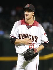 Arizona Diamondbacks starting pitcher Zack Greinke (21) reacts after a pitch Pittsburgh Pirates during the eighth inning. at Chase Field in Phoenix, Ariz. May 15, 2019. He pulled himself out of the game from an apparent injury.