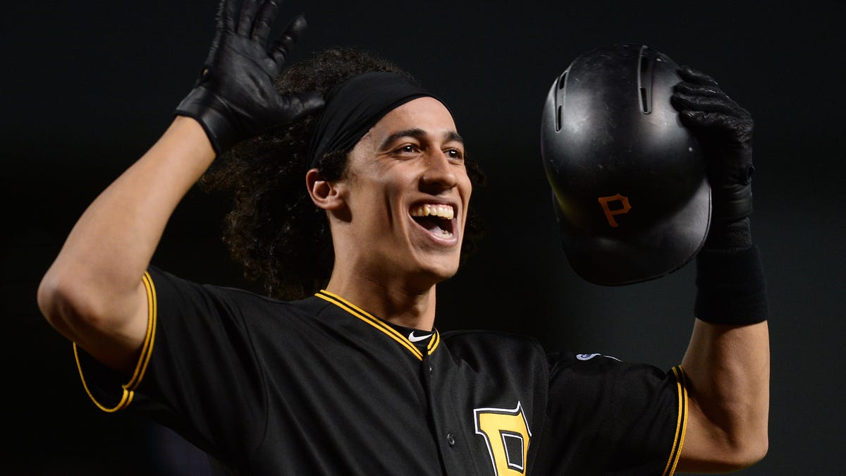Pirates shortstop Cole Tucker reacts after hitting a home run against the Diamondbacks.