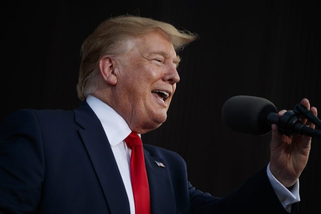 In this May 8, 2019, photo, President Donald Trump speaks at a rally in Panama City Beach, Fla. (AP Photo/Evan Vucci)