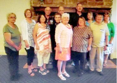 2019 Guernsey County Chapter of the Ohio Genealogical Society Board, back row, from left, are: Lucille Oliver, publications; Donna Bell, First Family & Pioneer Family, Randy Neff, president, Bob Erskine, IT, Roger Cotton, corresponding secretary, Angela Hajzak, recording secretary, and Cookie Connell, vice president; front row, from left: Debi Stiers, treasurer, Joy Erskine, trustee, Beth Wharton, trustee, Lyn Alfman, publicity, Sonny Alfman, constitution. Unable to attend: Attorney Kent Biegler, trustee.