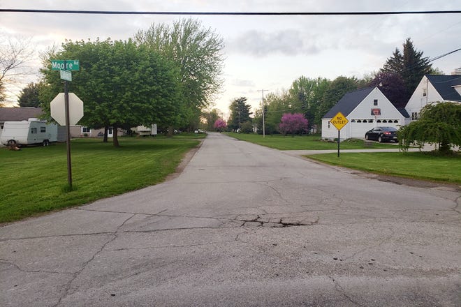 The intersection of Moore Road and Calvin Drive is pictured. First Street, Guernsey Drive and Calvin Drive are set to be repaved through a special assessment district in Adrian Township. The board took the next steps in finalizing the project Monday night.