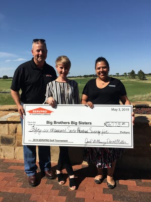 Big Brothers Big Sisters with the Lubbock chapter were given a $56,775 check from SERVPRO after an annual golf tournament fundraiser raised the funds for the organization. [provided by SERVPRO]
