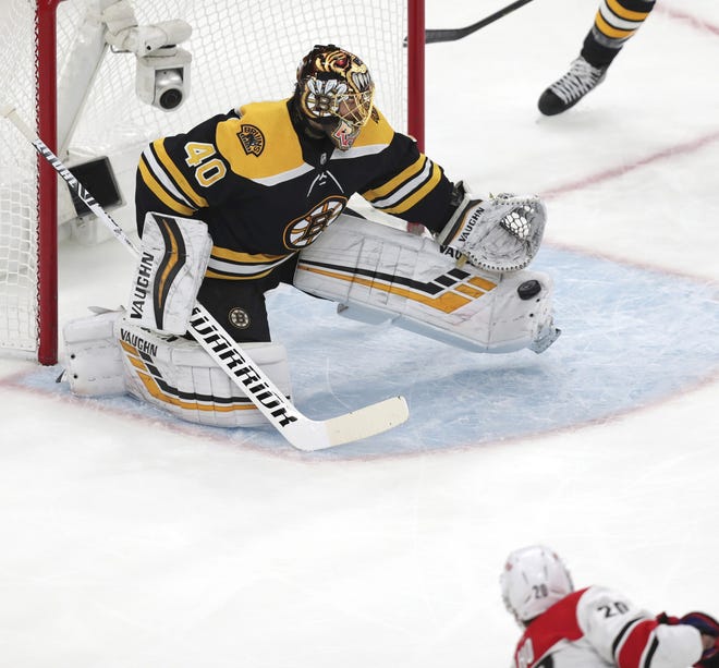 Boston Bruins goaltender Tuukka Rask (40), of Finland, makes a toe save on a shot by Carolina Hurricanes' Sebastian Aho (20), of Finland, during the first period in Game 1 of the NHL hockey Stanley Cup Eastern Conference finals, May 9, 2019, in Boston. [AP Photo/Charles Krupa]
