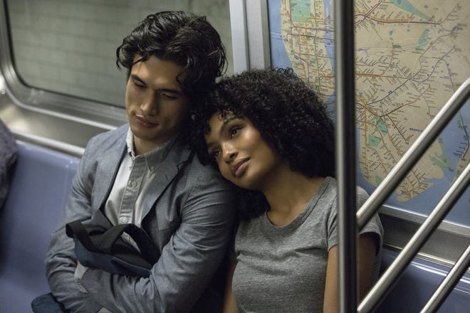 Daniel, played by Charles Melton, and Natasha, played by Yara Shahidi, meet in New York City on the day before she is scheduled to be deported, in "The Sun Is Also a Star." [Warner Bros. Pictures]