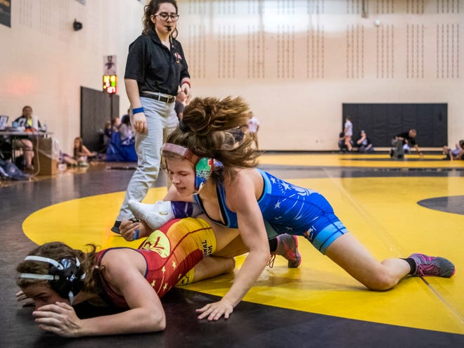 Kaylie wrestles senior Ciera Broukal in an exhibition match following the Indiana State Wrestling Association Women's Freestyle State tournament at Avon High School in Avon, Ind., Sunday morning, May 5, 2019. Broukal, a member of the Bloomington South Wrestling Club, won the practice match. 
