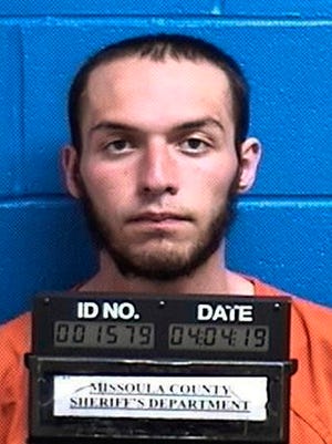 FILE - This April 4, 2019, file photo released by the Missoula County Sheriff's Office shows Fabjan Alameti, 21. Alameti, who federal agents say talked about joining an Islamic State group and attacking random people to avenge a shooting at two New Zealand mosques, has been ordered held in custody pending his June 24 trial in Montana. A U.S magistrate judge ruled Alameti, who has pleaded not guilty to possession of a firearm by an unlawful user of a controlled substance and making false statements involving international and domestic terrorism, poses too great a threat to the community to return to his mother's apartment in the Bronx. (Missoula County Sheriff's Office via AP, File)