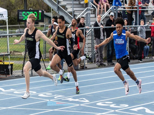Greenfield's Michael Gorman wins the boys 100 meter dash at the Woodland Conference Track and Field Championships in West Allis on Tuesday, May 14, 2019.