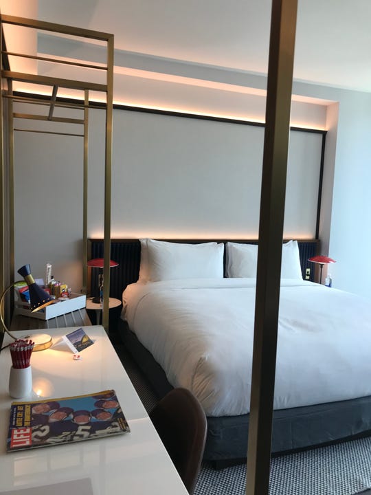 The hotel room at the TWA Hotel is fitted with retro furniture and accessories including a Life Magazine on every desk.