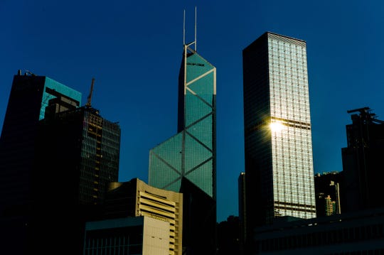 The Bank of China tower, center, was designed by I.M. Pei. The preeminent architect who forged a distinct brand of modern building design with sharp lines and stark structures, died May 16 at age 102.