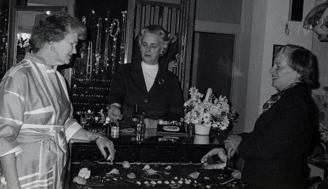 From left, Mrs. Robert Sparks, Mrs. John Boyden, and Mrs. Carl Behr work on a fashion show to benefit Cape Cod Hospital, which was held at Dunfey’s Hyannis Resort in May 1979. [BARNSTABLE PATRIOT FILES/W.B. NICKERSON CAPE COD HISTORY ARCHIVES]