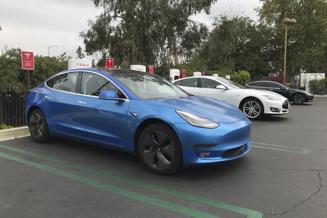 Tesla vehicles have a slight edge on public chargers, compared to other EVs, due to their widespread availability and faster charge speeds. [Edmunds, file / Ronald Montoya]