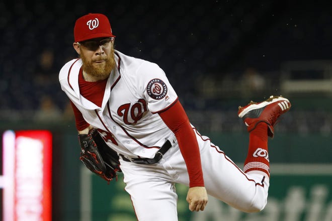 Washington Nationals reliever Sean Doolittle follows through on a pitch to a St. Louis Cardinals batter during the ninth inning of a game May 2 in Washington. [AP Photo/Patrick Semansky]