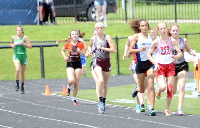 The girls reach the straight in the 3200 meter run during the OHSAA Division II Easter District Track and Field Championships on Saturday at Meadowbrook High School.