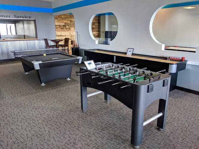 Gameroom Concepts specializes in billiards, shuffleboard and air hockey — as well as patio furniture. [Cassandra Bondie/Sentinel Staff]