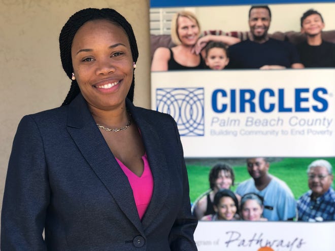 TaQuoya Scott-Woodson graduated from the Circles program in 2016, where she learned about personal finance, saving and more life skills to break the cycle of poverty. She now owns a house and runs her own event-planning business on the side. [HANNAH MORSE/palmbeachpost.com]