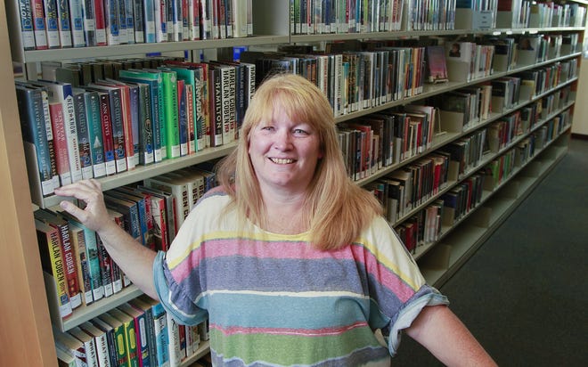 Denise O'Neal, a board member with the San Diego Council on Literacy for adult learners, poses for photos at the San Marcos Library on Tuesday, April 23, 2019 in San Marcos, Calif. (Eduardo Contreras/San Diego Union-Tribune/TNS)