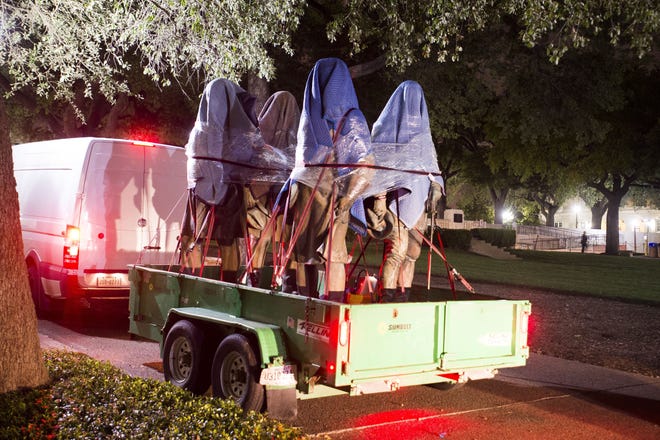 Confederate statues are removed from the University of Texas South Mall on Aug. 20, 2017. [Marsha Miller/University of Texas]