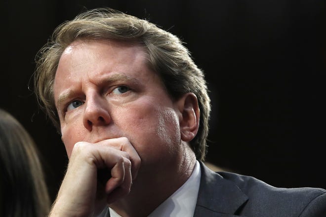 In this Sept. 4, 2018, file photo, former White House counsel Don McGahn listens as he attends a confirmation hearing for Supreme Court nominee Brett Kavanaugh before the Senate Judiciary Committee on Capitol Hill in Washington. [JACQUELYN MARTIN/ASSOCIATED PRESS]