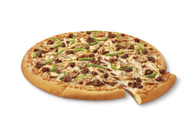 This undated image provided by Little Caesars shows the Impossible Supreme pizza. Plant-based burger maker Impossible Foods is debuting its second product - meatless sausage crumbles - on Little Caesars pizza. Little Caesars will start testing the Impossible Supreme Pizza on Monday, May 20, 2019, at 58 restaurants in Fort Myers, Florida; Yakima, Washington; and Albuquerque, New Mexico. If the test goes well, Detroit-based Little Caesars could expand availability nationwide. (Little Caesars via AP)