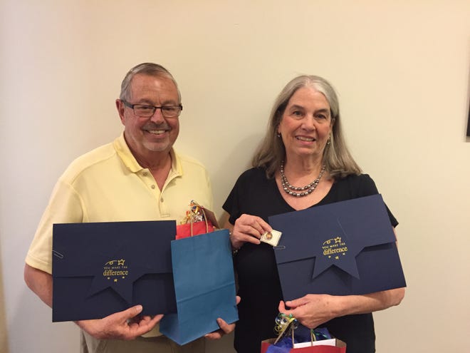 Two Fairfield Harbour residents were awarded the coveted Volunteer of the Year awards at the CarolinaEast Hospital Auxiliary Volunteer Appreciation Luncheon in April. Neil Ober (left) received the ìWe Careî award and Cynthia Scalion received the ìWe Supportî award. [CONTRIBUTED PHOTO]