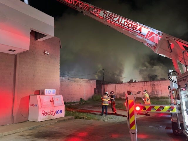 Tuscaloosa Fire and Rescue Service firefighters were called to 2315 10th St. just before midnight Sunday, May 19, 2019. There was heavy smoke and fire coming from the building that includes Bar 17 and West Park Florist. [Photo by Tuscaloosa Fire and Rescue Service]