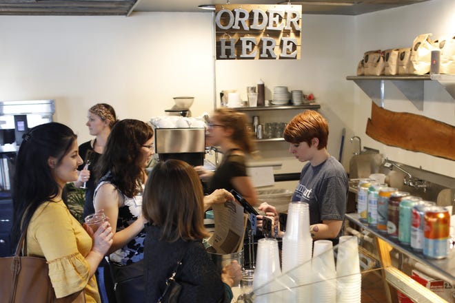 Customers order at The Farm Cart´s new brick-and-mortar location on Baxter Street on Tuesday, May 14, 2019. The Athens Farmers Market staple is now available seven days a week serving breakfast and lunch. [Photo/ Joshua L. Jones, The Athens Banner-Herald]